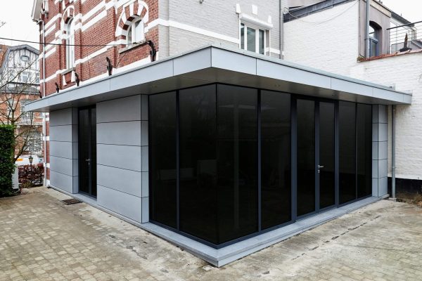 New modern extension of a house with big glasses windows and doors